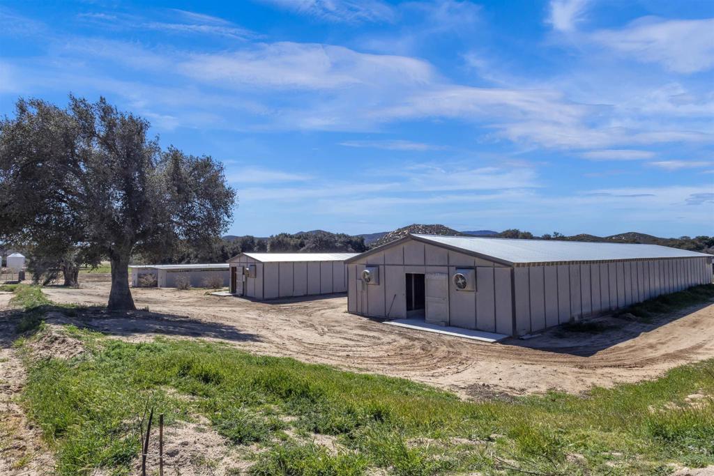 35683 Breezy Lane Ranchita, CA 92066 - Photo 28 of 73 a view of a house with a yard and wooden fence