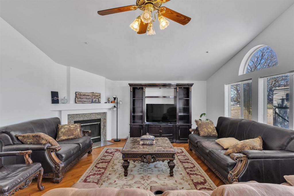 35683 Breezy Lane Ranchita, CA 92066 - Photo 49 of 73 a living room with furniture a fireplace and a flat screen tv