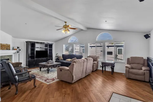 a bathroom with a toilet and a mirror