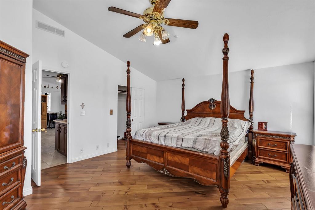 35683 Breezy Lane Ranchita, CA 92066 - Photo 63 of 73 a bed room with a bed and a chandelier