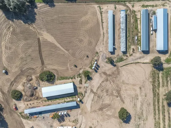 a view of a porch with wooden floor and furniture