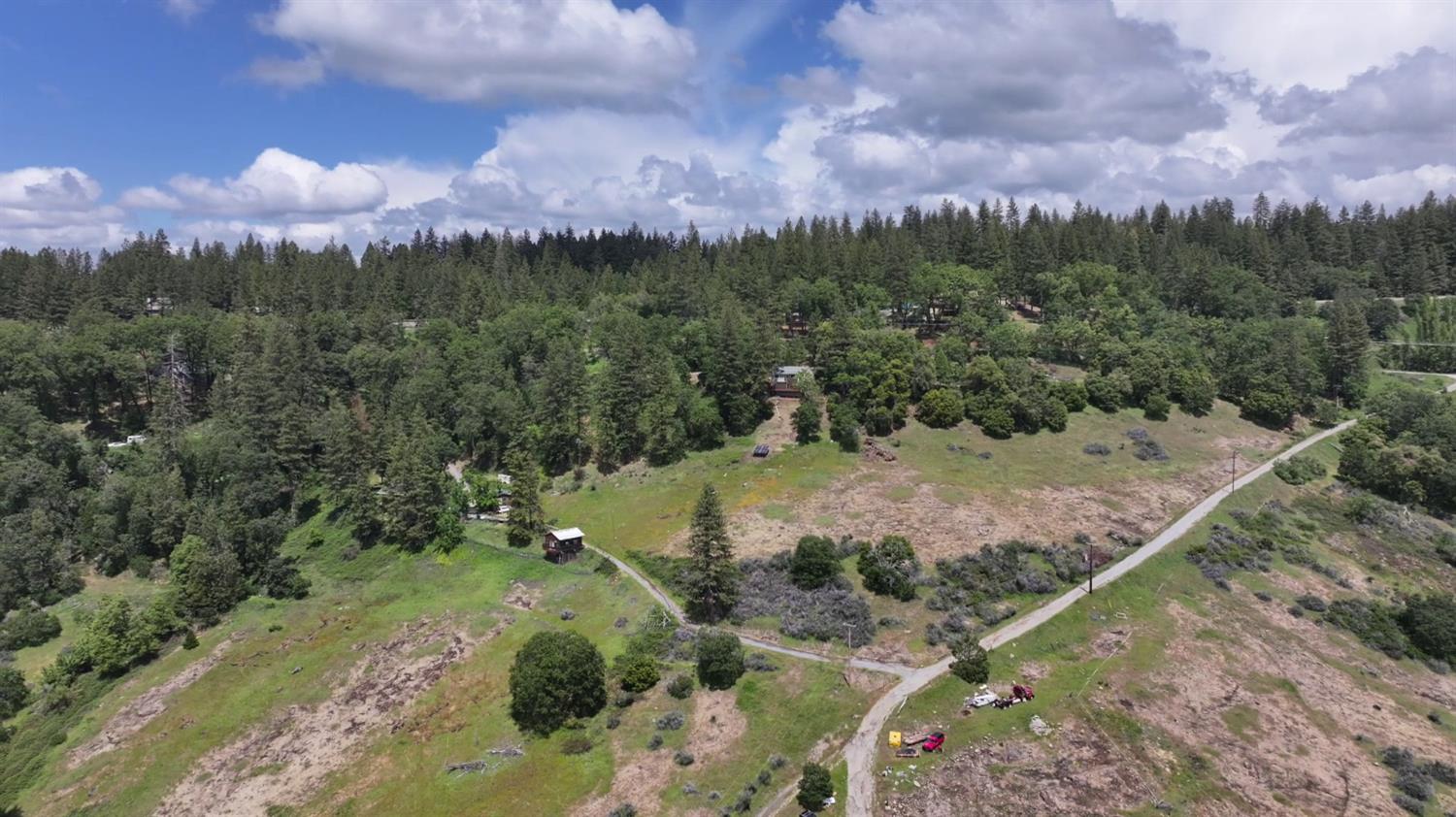 4850 8 Mile Road Camino, CA 95709 - Photo 21 of 30 a view of a city with lush green forest