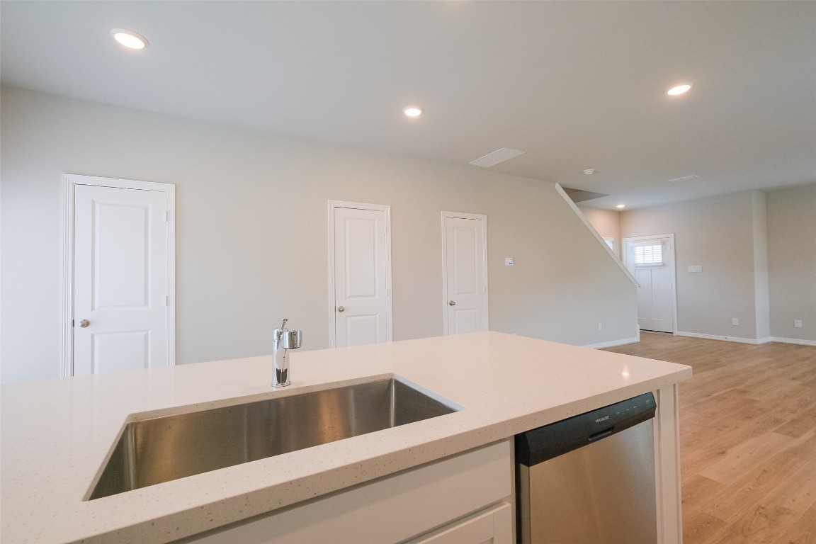 6434 New York Street Houston, TX 77021 - Photo 10 of 27 a view white cabinets and a sink