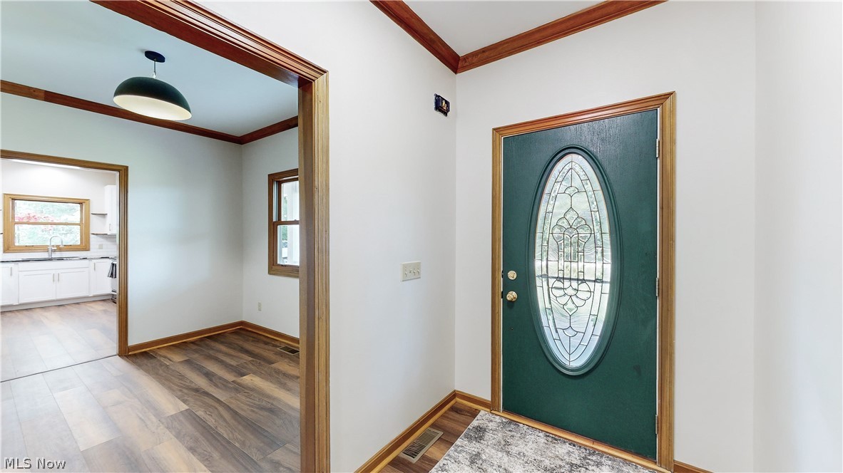 7609 Carter Road Northfield, OH 44067 - Photo 21 of 50 Front foyer area leads to flex room & Great room