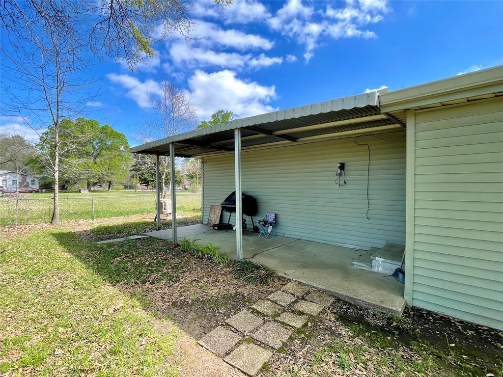 10806 Newson Road Keithville, LA 71047 - Photo 24 of 24 a view of a porch with a backyard
