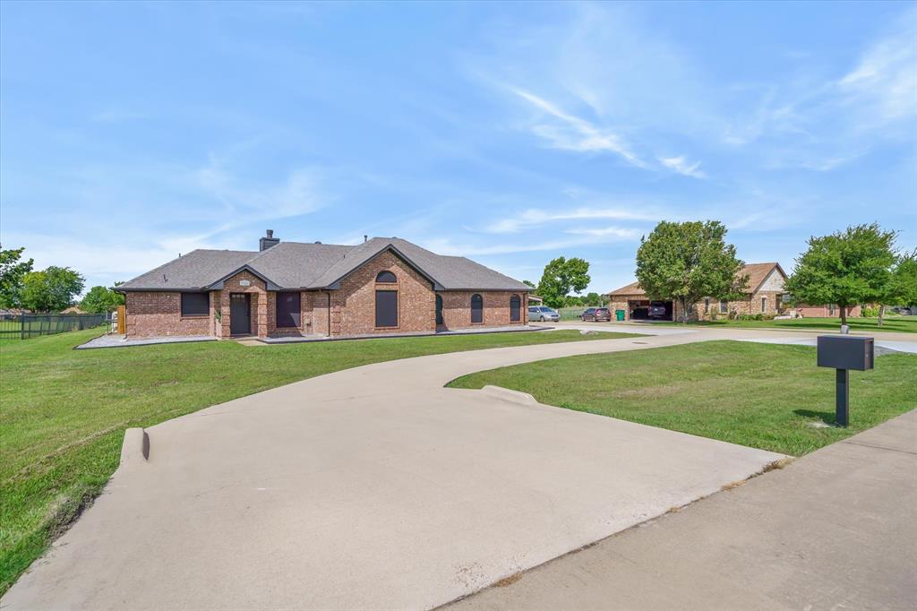 9346 Homestead Lane Forney, TX 75126 - Photo 38 of 39 Nice curb appeal and a circle drive -- this property is a standout in the neighborhood!