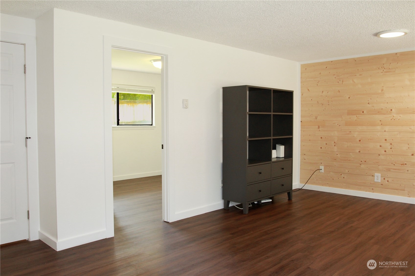 18817 Southeast 134th Street Renton, WA 98059 - Photo 18 of 27 an empty room with wooden floor and closet