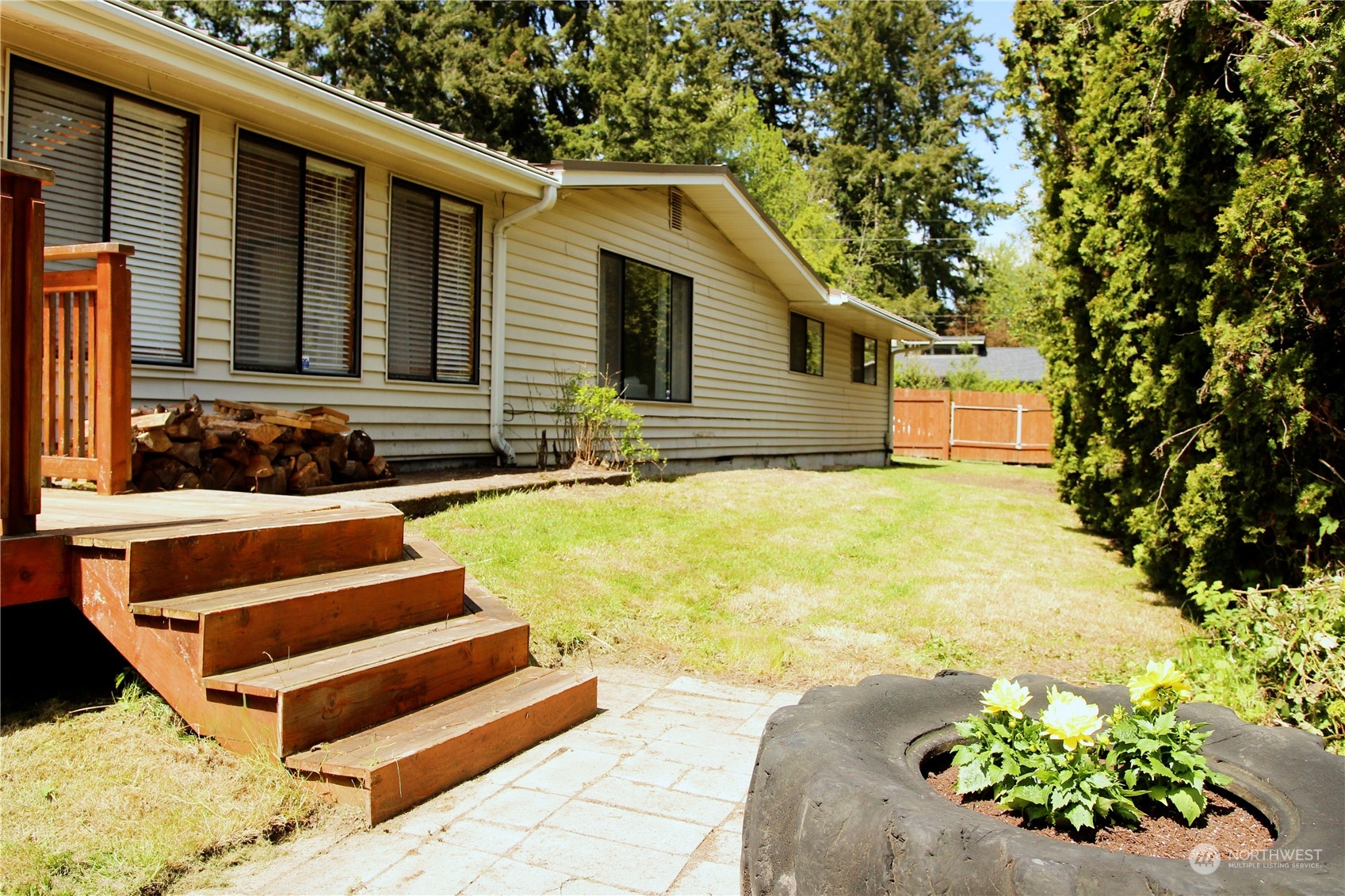 18817 Southeast 134th Street Renton, WA 98059 - Photo 25 of 27 a view of a house with a yard