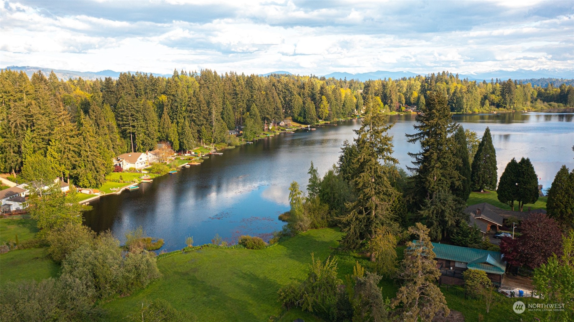18817 Southeast 134th Street Renton, WA 98059 - Photo 27 of 27 a view of a lake with a mountain in the background