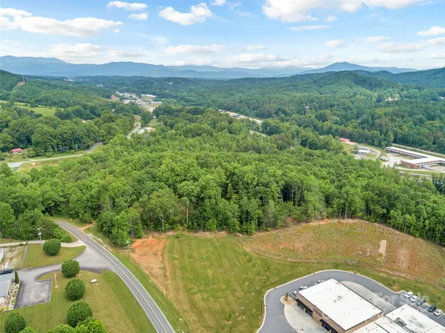 a view of a back yard from a balcony