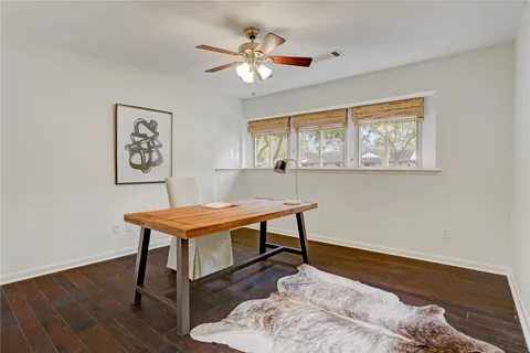 a room with chandelier furniture and a window