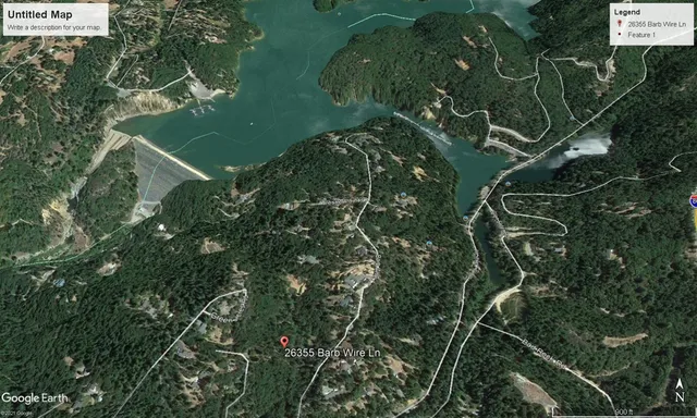 a view of a city with lush green forest