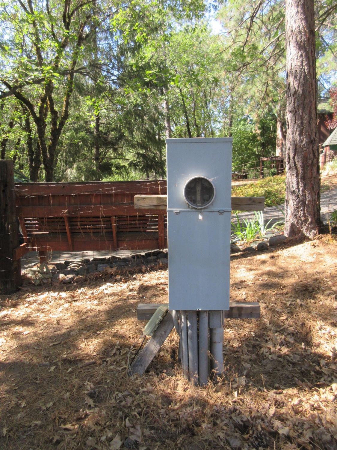 26355 Barb Wire Lane Colfax, CA 95713 - Photo 10 of 43 a backyard of a house with table and chairs