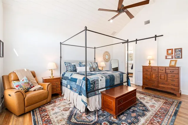 a bed room with a bed and a couch