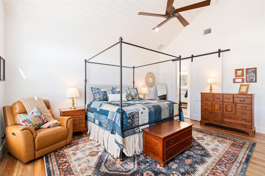 714 Bethel Road Waxahachie, TX 75167 - Photo 17 of 40 a bed room with a bed and a couch