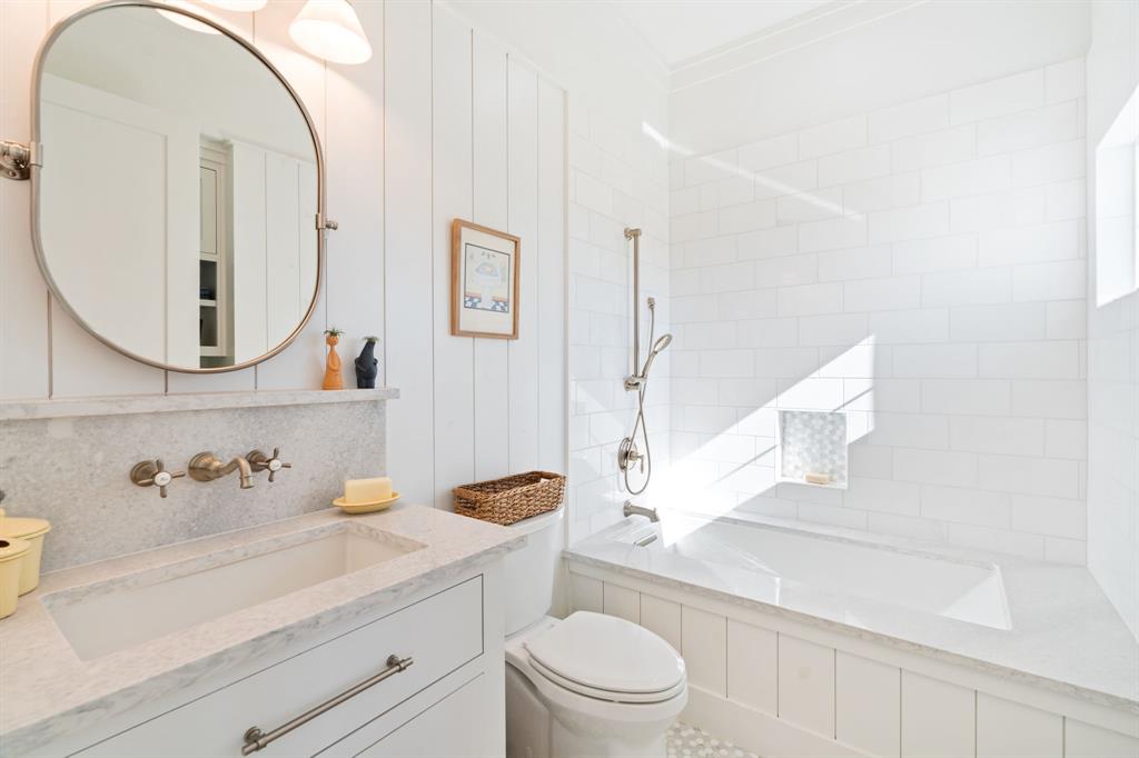 714 Bethel Road Waxahachie, TX 75167 - Photo 24 of 40 a bathroom with a sink a toilet and a mirror
