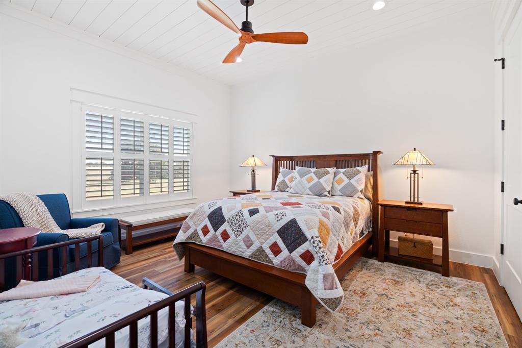 714 Bethel Road Waxahachie, TX 75167 - Photo 25 of 40 a bed room with a bed and chair