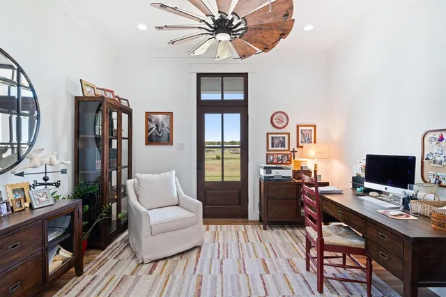 a view of a livingroom with furniture and wooden floor