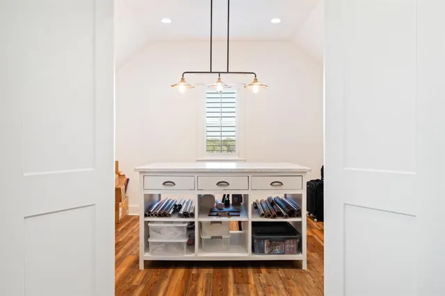 a view of storage and utility room with washer and dryer