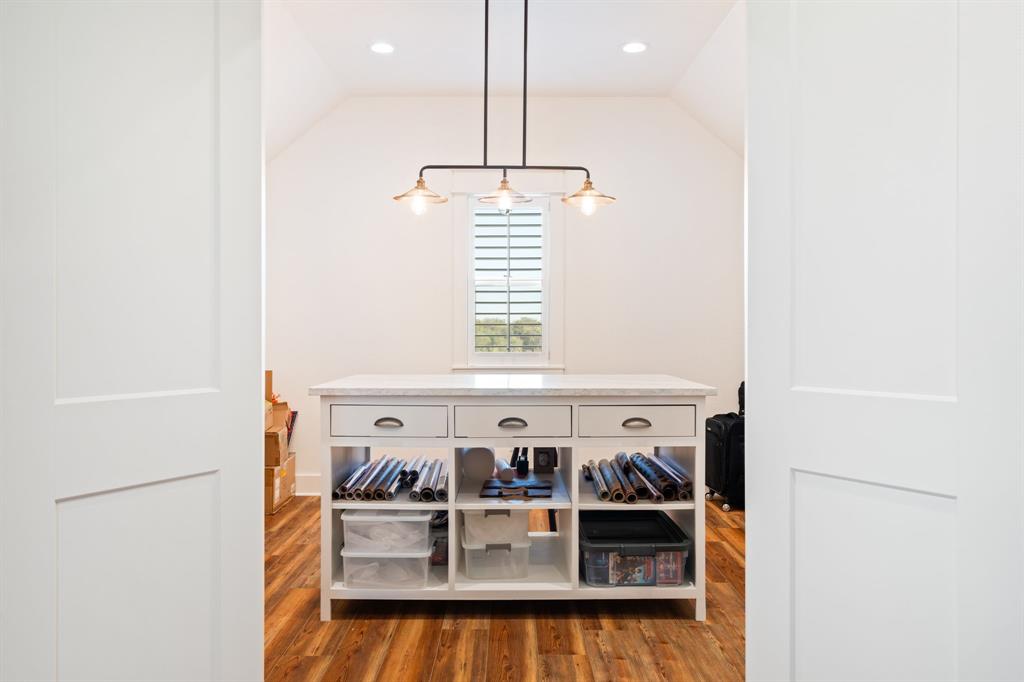 714 Bethel Road Waxahachie, TX 75167 - Photo 31 of 40 a view of storage and utility room with washer and dryer