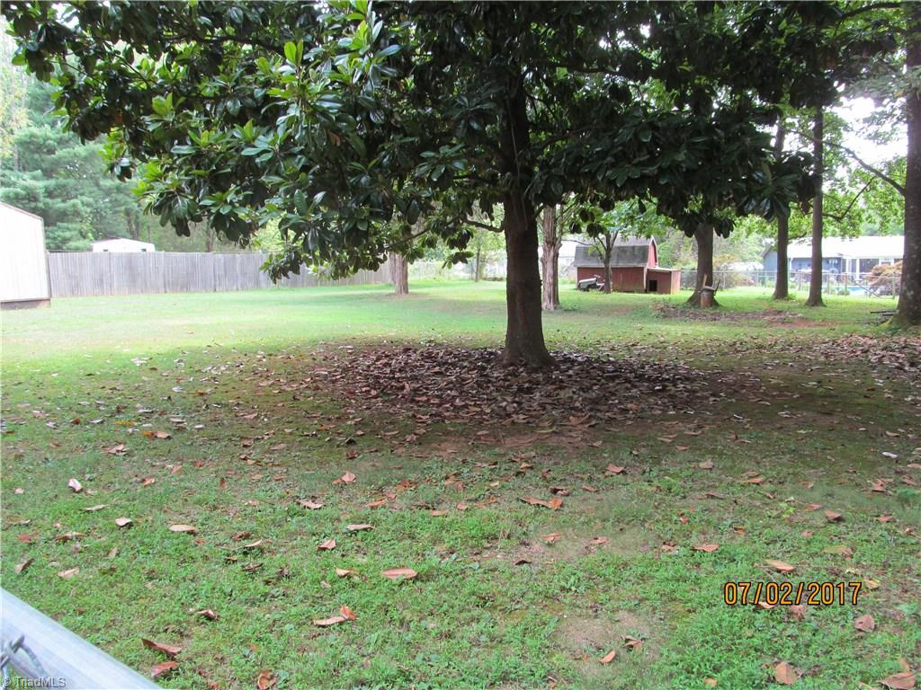 4174 County Line Road Thomasville, NC 27360 - Photo 8 of 28 LARGE FENCHED BACK YARD WITH 2 STORAGE SHEDS