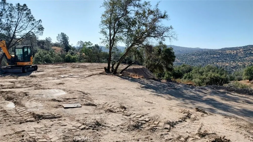 4 Powder Horn Lane Coarsegold, CA 93614 - Photo 7 of 14 a view of a yard with a tree
