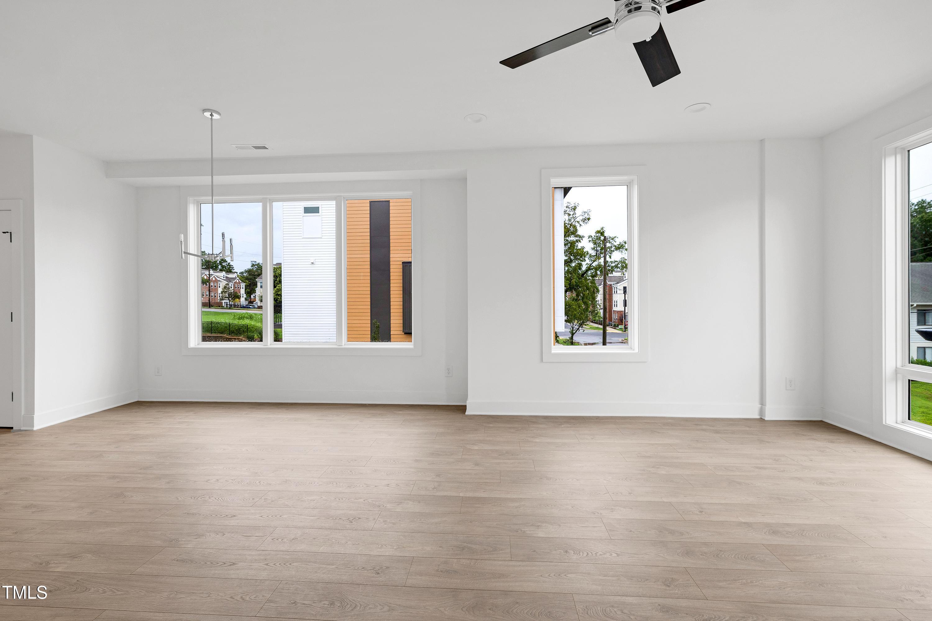 1412 Sawyer Road, Unit 101 Raleigh, NC 27610 - Photo 16 of 33 a view of an empty room with a window