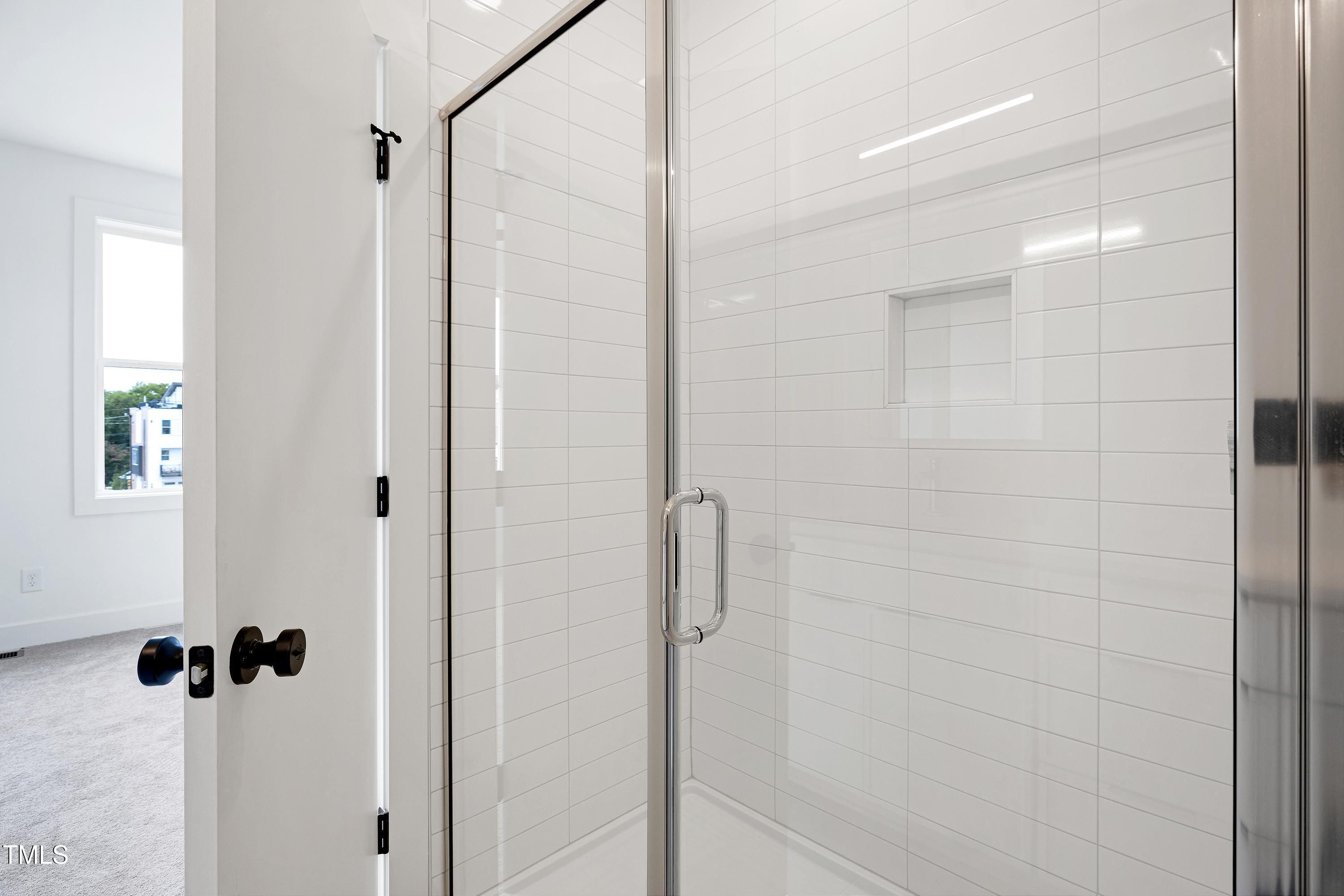 1412 Sawyer Road, Unit 101 Raleigh, NC 27610 - Photo 23 of 33 a bathroom with a shower