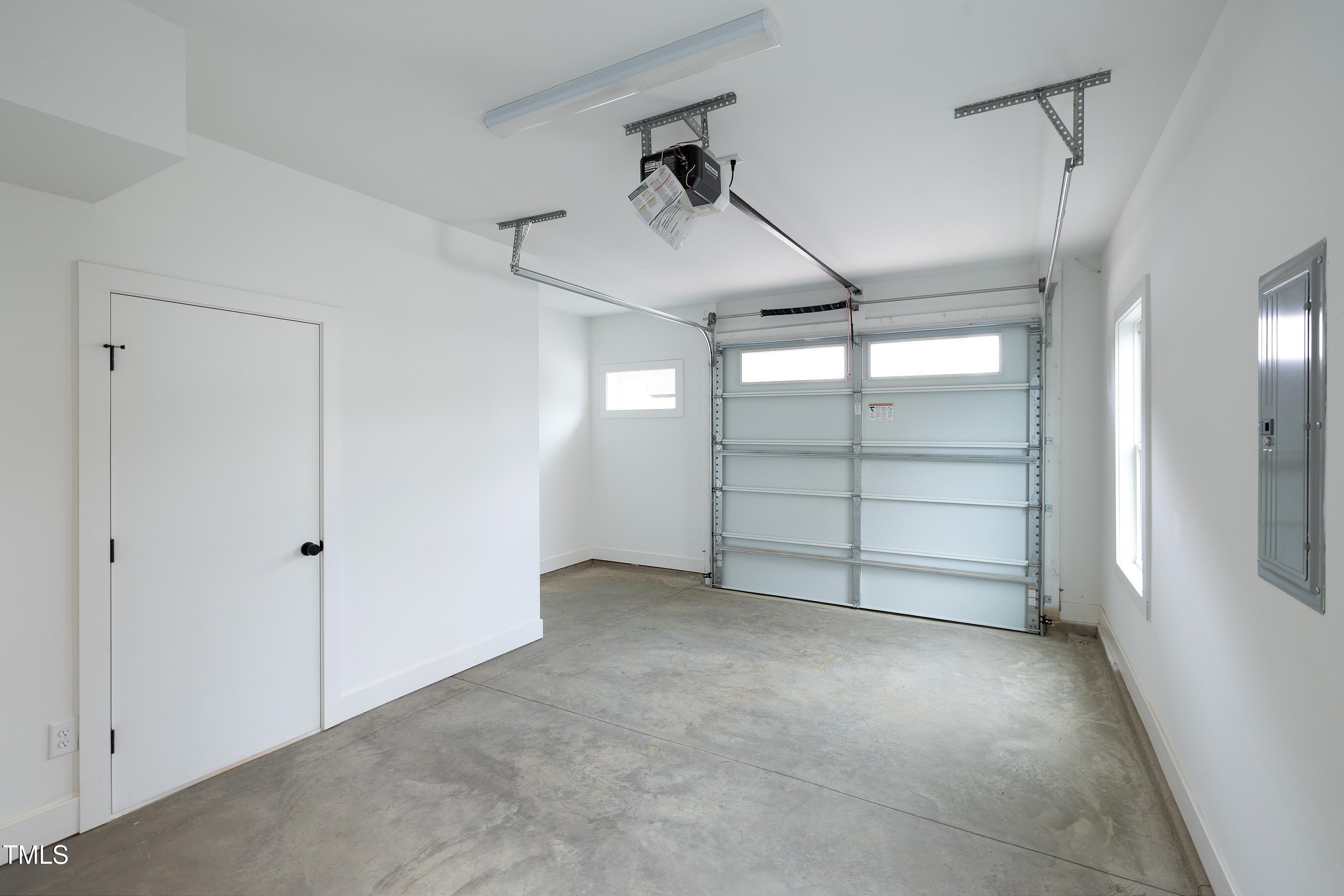 1412 Sawyer Road, Unit 101 Raleigh, NC 27610 - Photo 31 of 33 a view of a room with storage and utility room