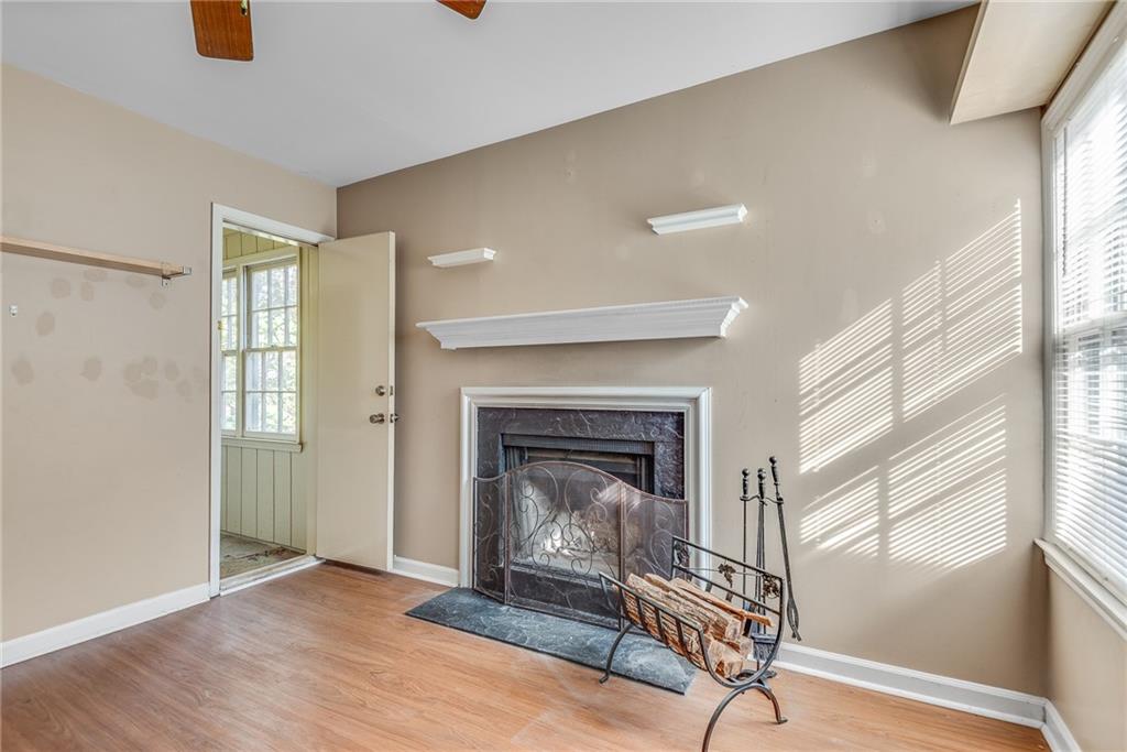 134 Lablanc Way Northwest Atlanta, GA 30327 - Photo 13 of 42 a living room with furniture and a fireplace