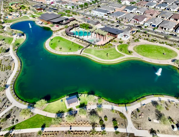 an aerial view of a house with swimming pool