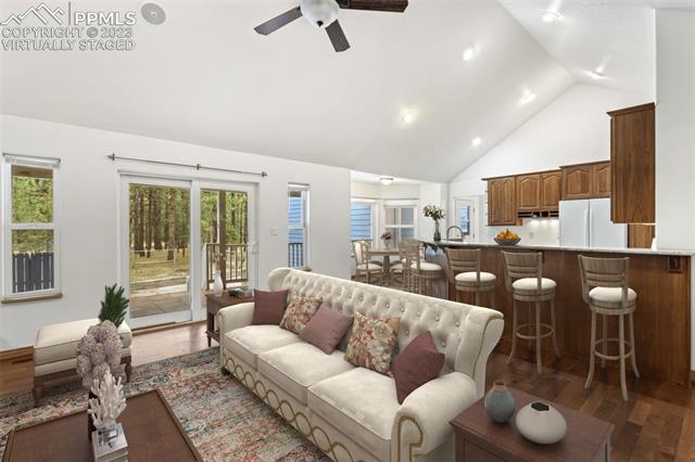 9860 Hardy Road Colorado Springs, CO 80908 - Photo 4 of 6 virtually staged great room toward kitchen