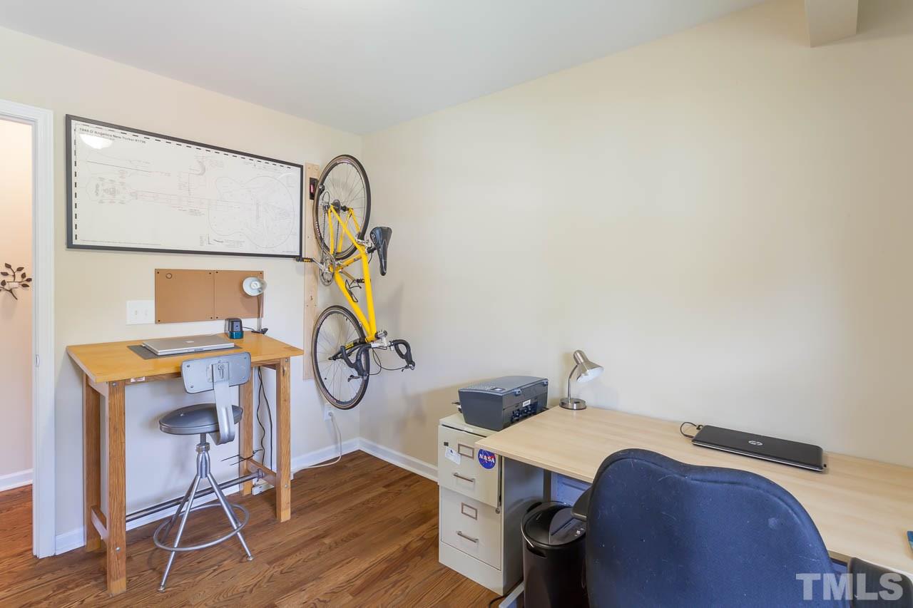 1211 Marlborough Road Raleigh, NC 27610 - Photo 14 of 22 a view of workspace with wooden floor