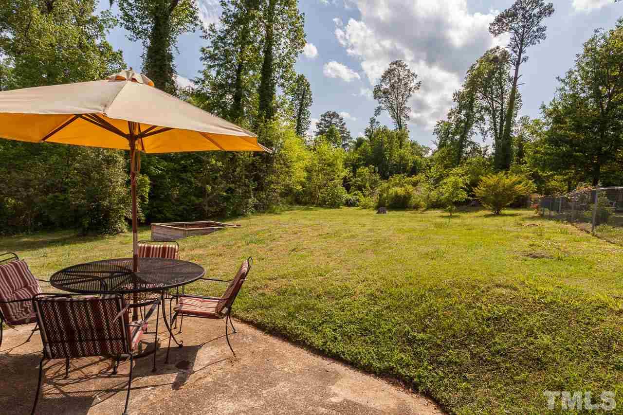 1211 Marlborough Road Raleigh, NC 27610 - Photo 8 of 22 a view of a swimming pool with a patio