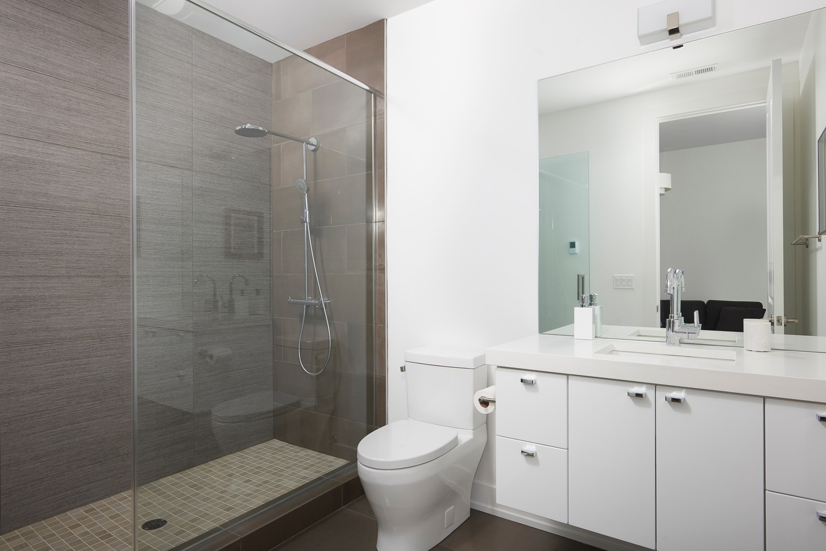 440 North Halsted Street, Unit 3A Chicago, IL 60642 - Photo 15 of 18 a bathroom with a granite countertop sink toilet and shower
