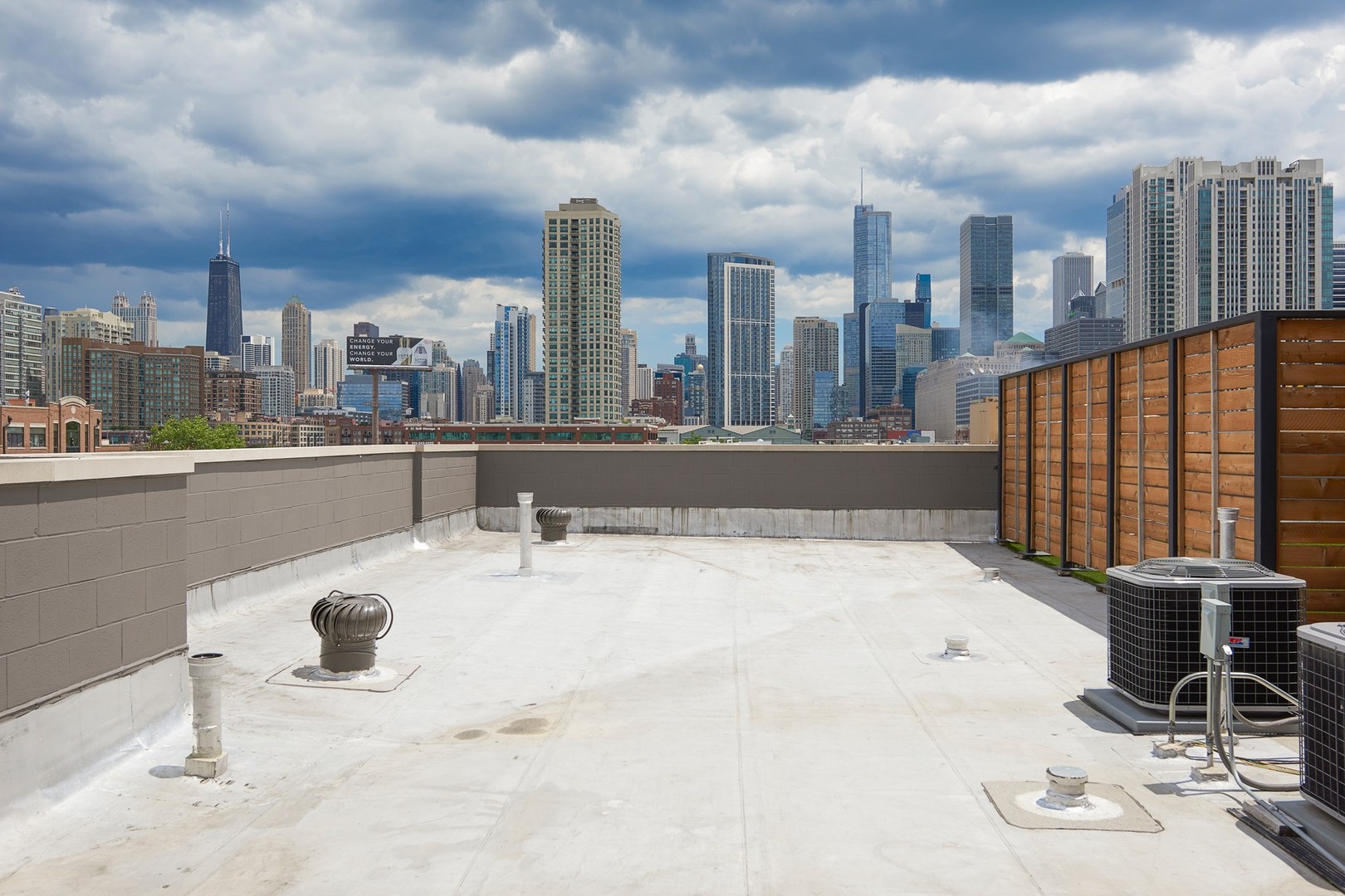 440 North Halsted Street, Unit 3A Chicago, IL 60642 - Photo 18 of 18 a view of a terrace with wooden benches