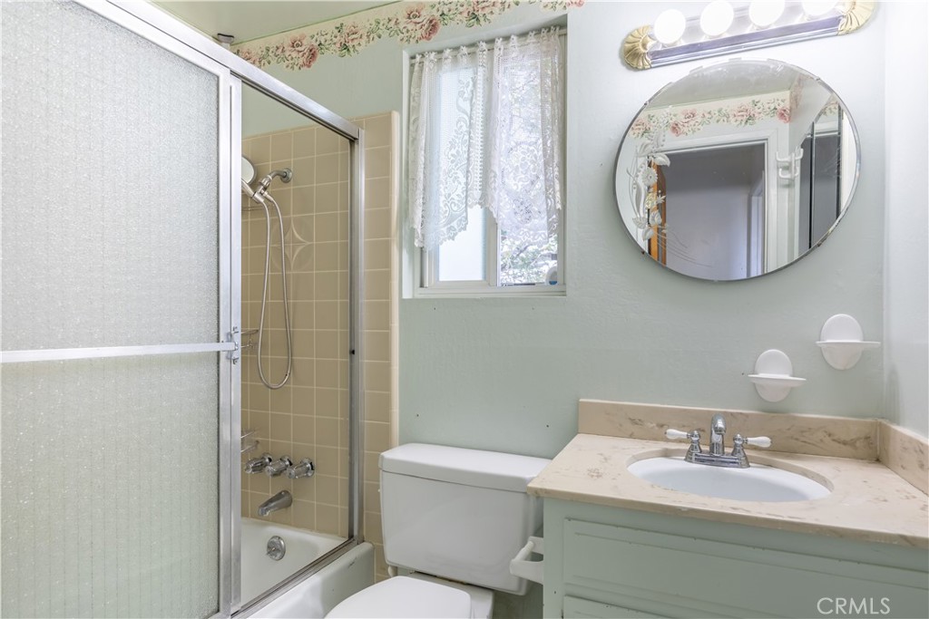 1268 Aleutian Drive Lake Arrowhead, CA 92352 - Photo 19 of 33 a bathroom with a sink and a mirror