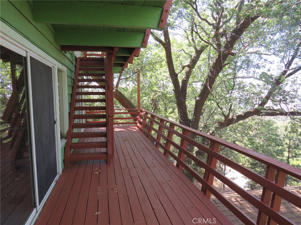 1268 Aleutian Drive Lake Arrowhead, CA 92352 - Photo 28 of 33 a view of balcony with wooden floor