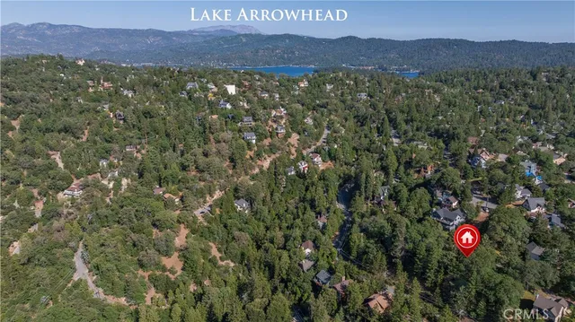 a view of a lush green hillside and a building
