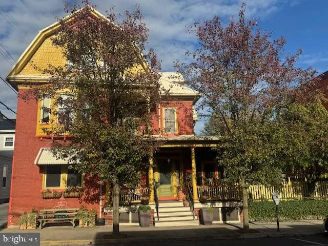 front view of a house with a street