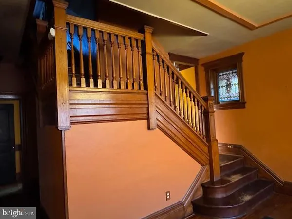 a living room with entrance gate