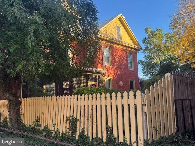 a front view of a house having yard