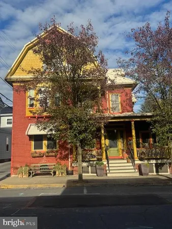 a view of a building and a street