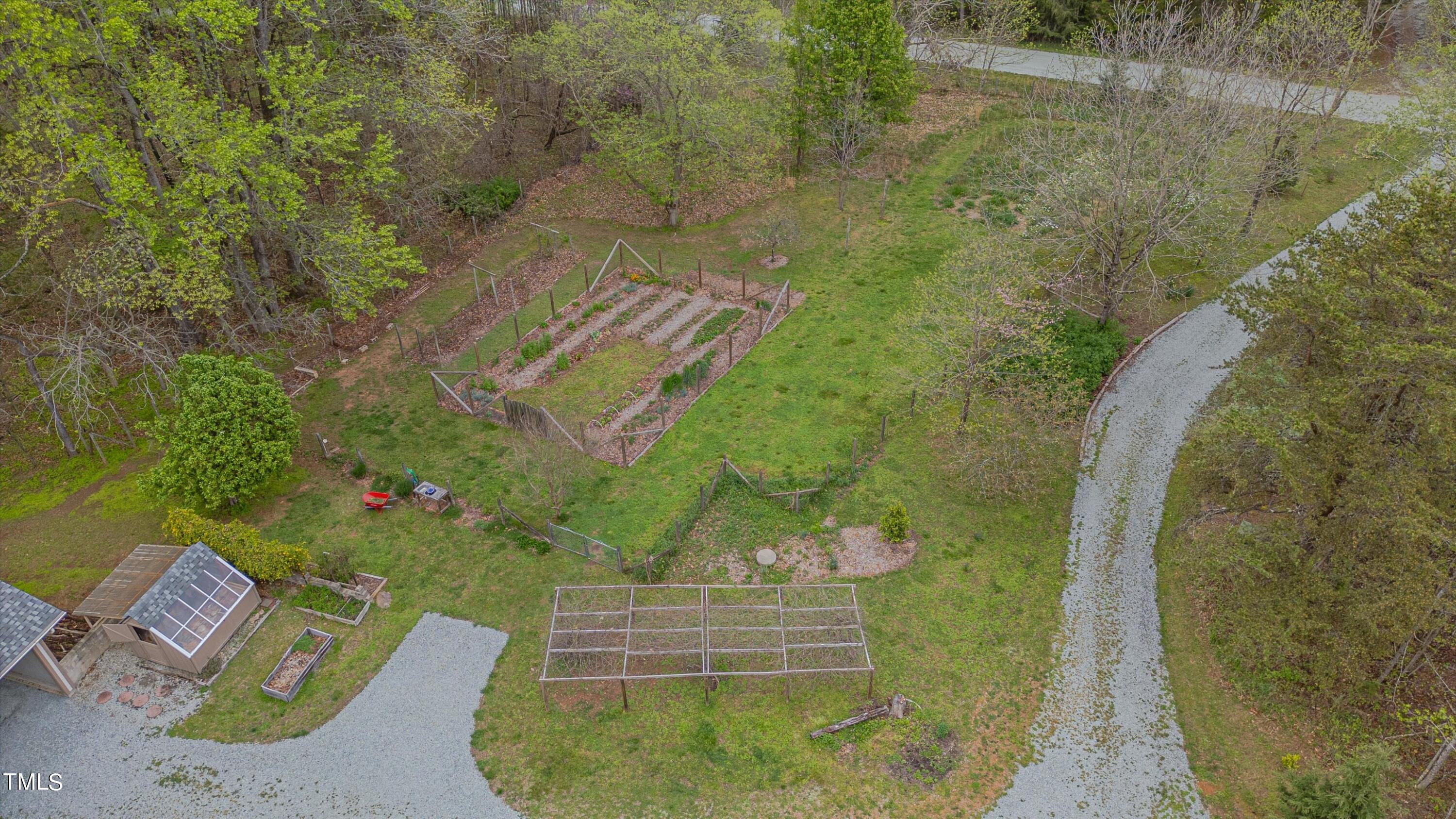 377 Potluck Farm Road Rougemont, NC 27572 - Photo 46 of 54 377 Potluck Farm Rd is 3 acres of gardens, greenery, and outdoor enjoyment