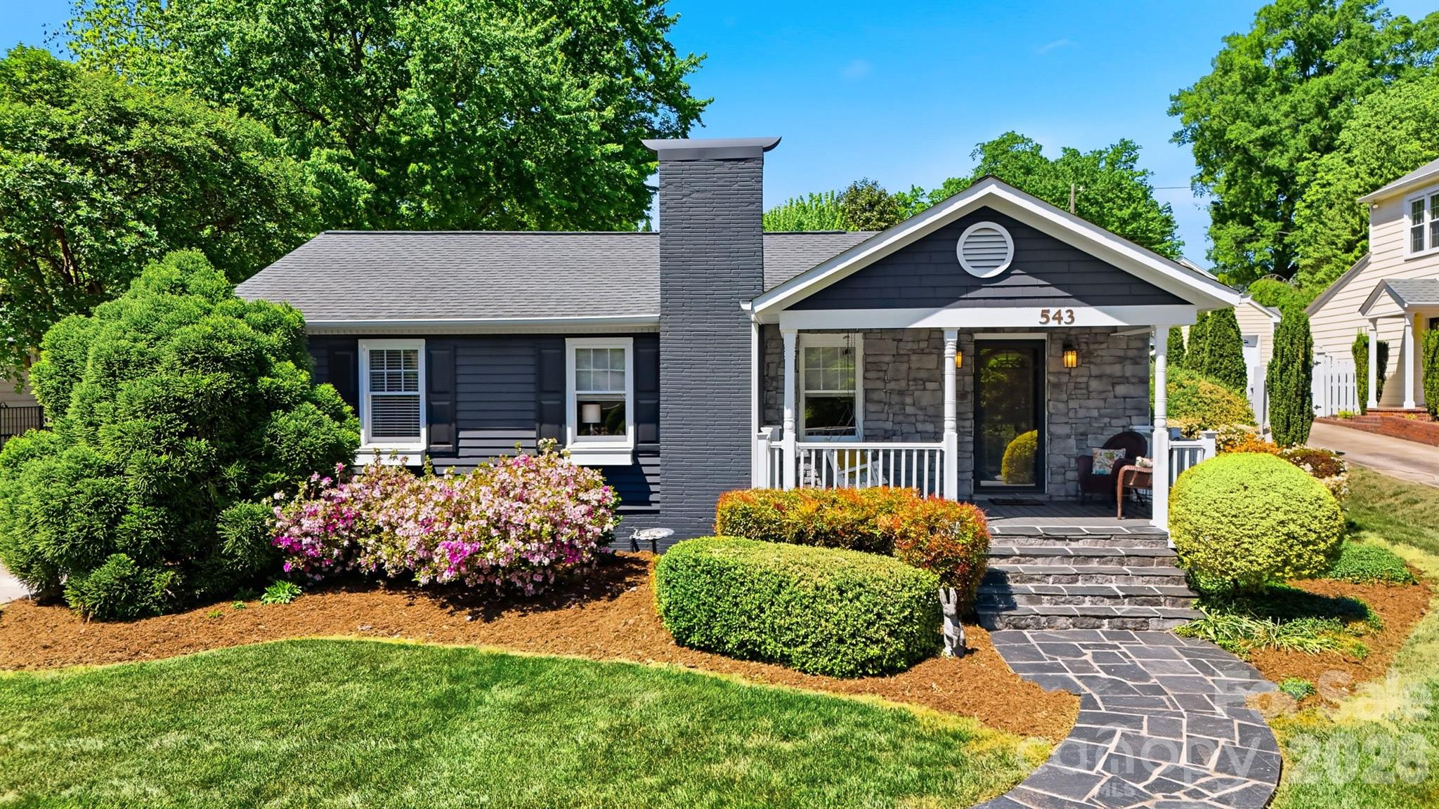543 5th Street Northwest Hickory, NC 28601 - Photo 1 of 43 a front view of a house with garden