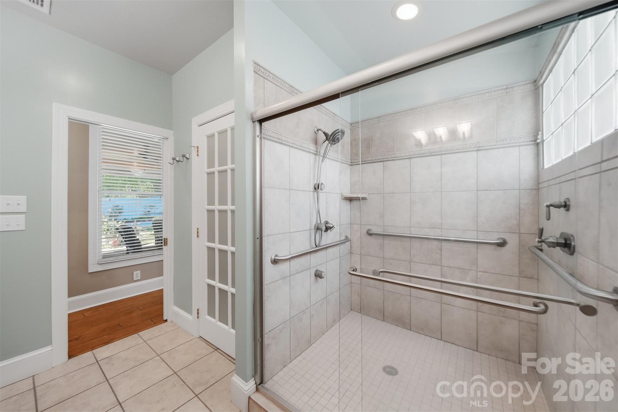 543 5th Street Northwest Hickory, NC 28601 - Photo 23 of 43 a bathroom with a shower and tub