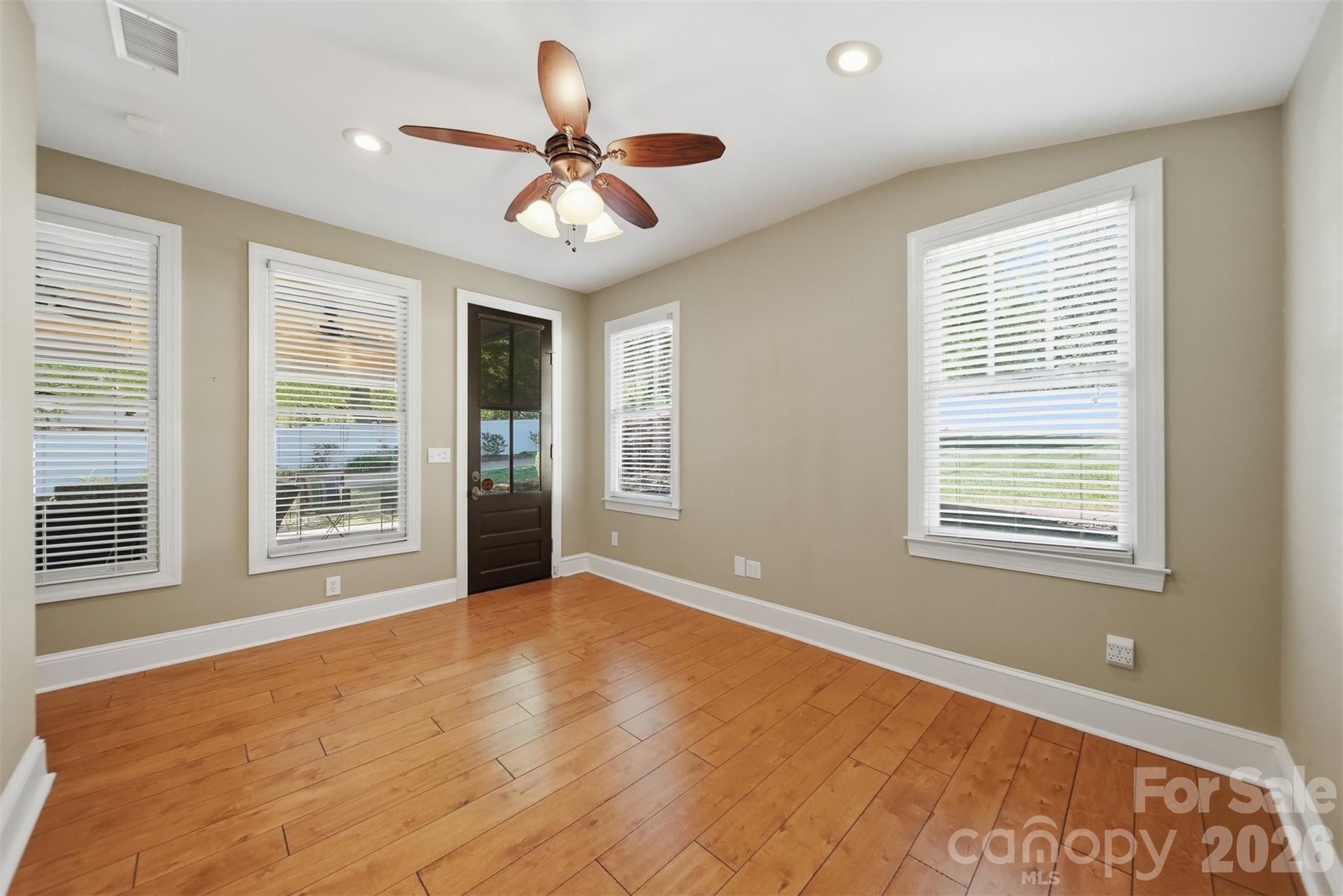 543 5th Street Northwest Hickory, NC 28601 - Photo 24 of 43 a view of an empty room with a window and a chandelier fan