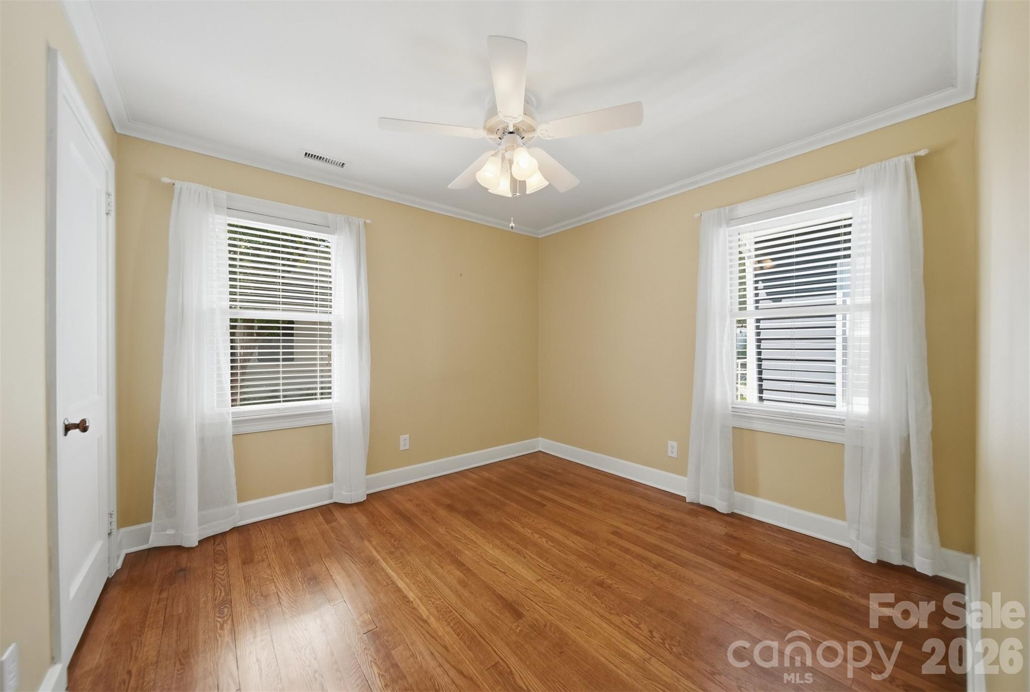 543 5th Street Northwest Hickory, NC 28601 - Photo 25 of 43 a view of an empty room with wooden floor and a window