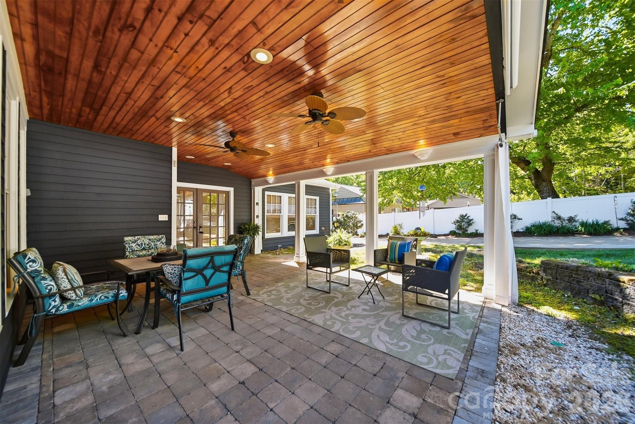 543 5th Street Northwest Hickory, NC 28601 - Photo 32 of 43 a view of a dinning table and chairs in the patio