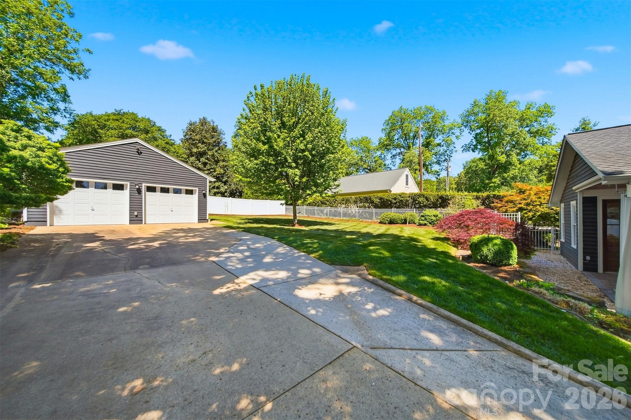543 5th Street Northwest Hickory, NC 28601 - Photo 35 of 43 a house with garden in the background